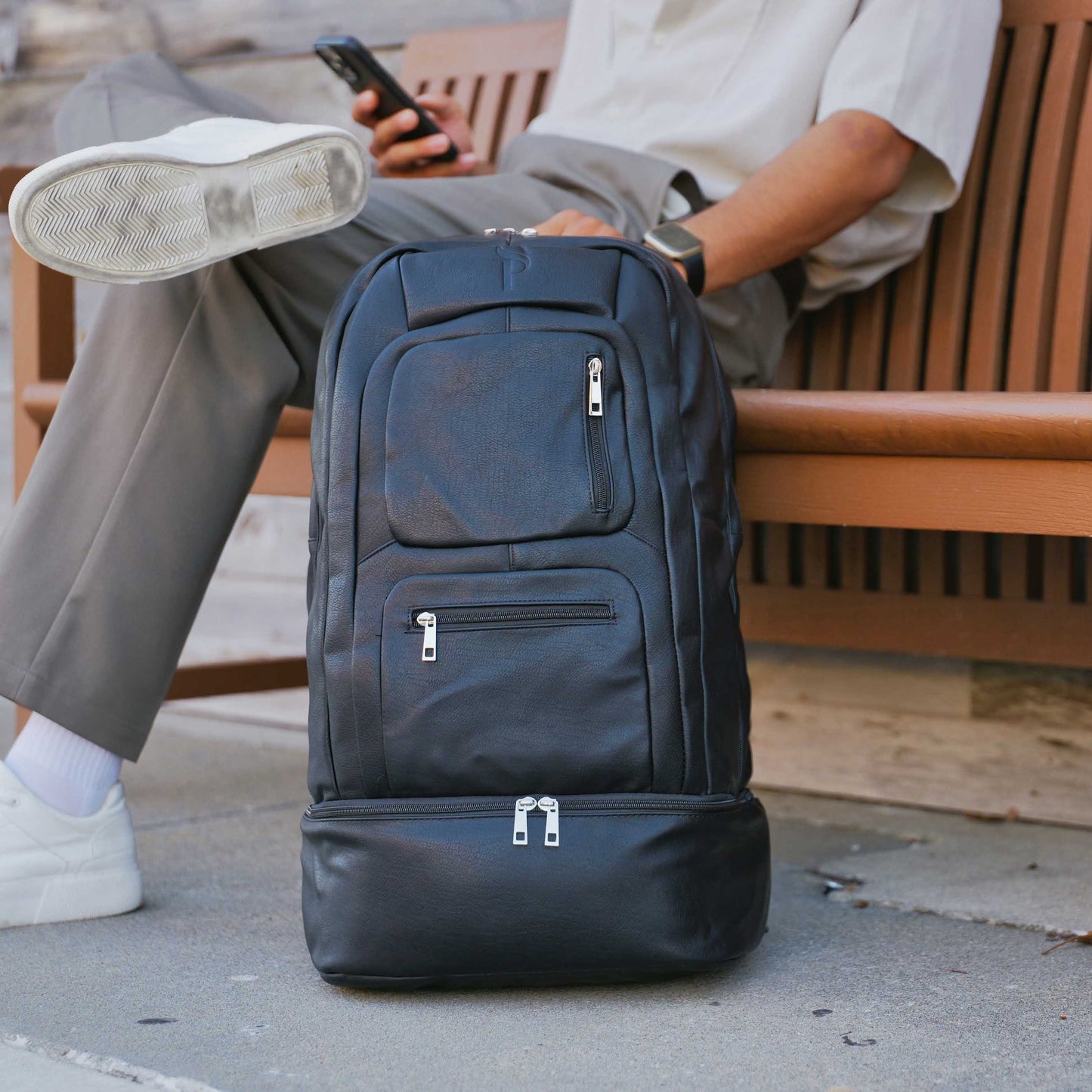 Black Leather Patented Carry On Backpack